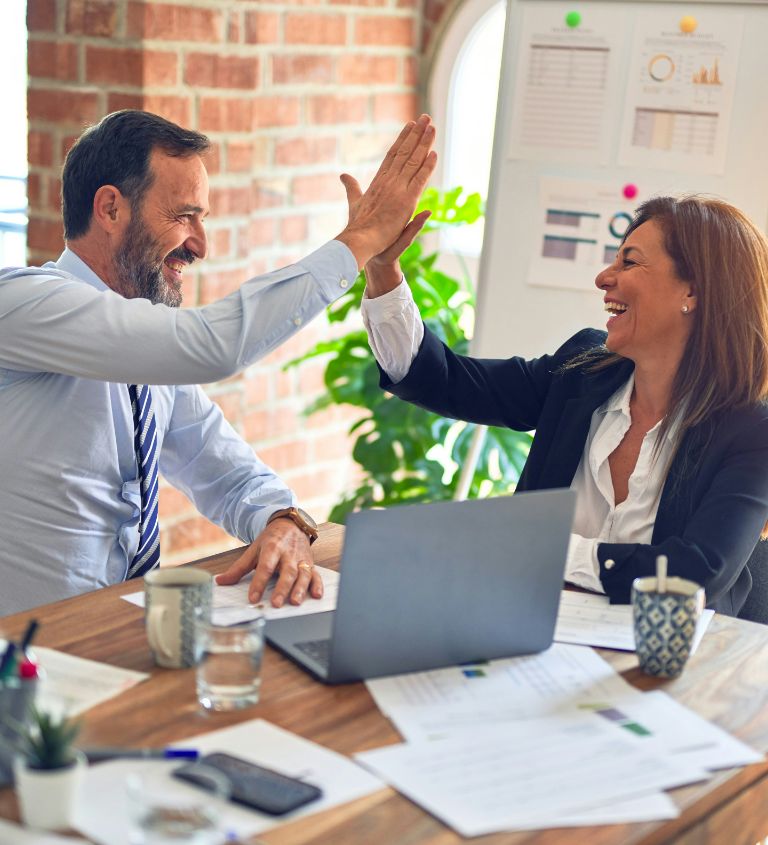 Business team giving high five